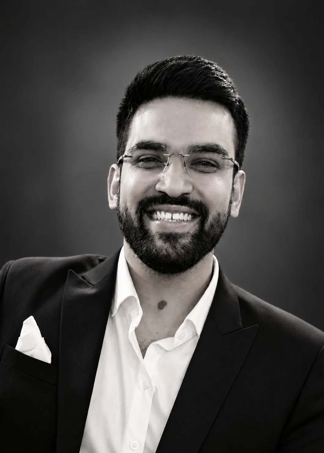 Black and white portrait of Madhuresh Mishra